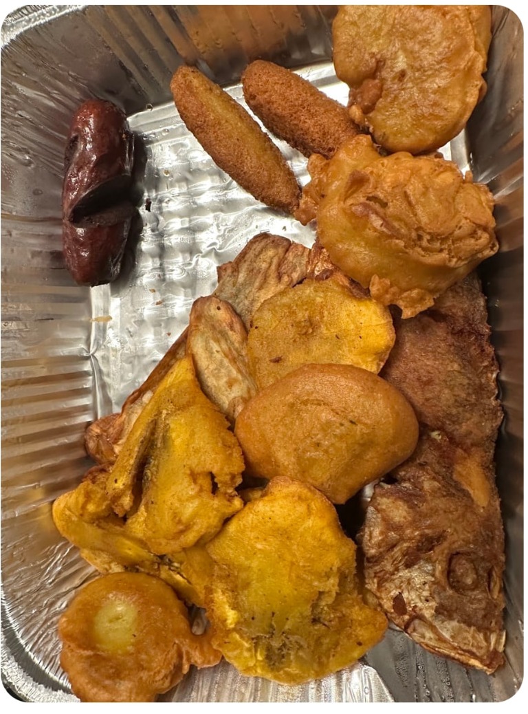 Fritaille platter of Haitian fritters, fried plantains and meats photographed by guest Ed