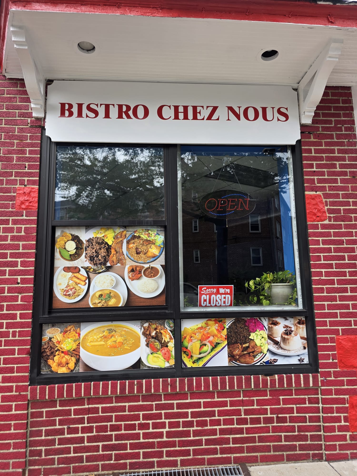 The Bristrot Chez Nous storefront on Centre Ave with its large sign